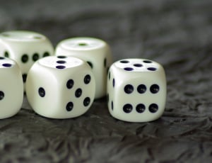 four white and black dice thumbnail