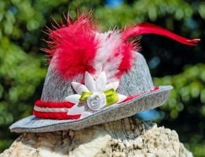 gray hat with flower accent thumbnail