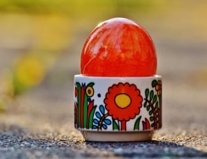 red and white ceramic toy thumbnail