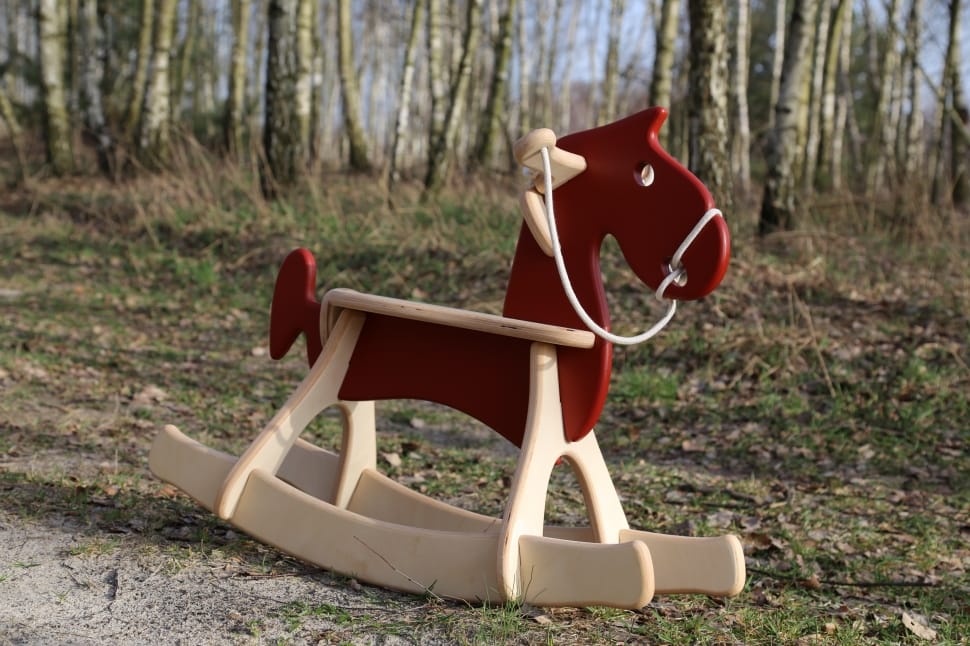 toddler's red and white rocking horse preview