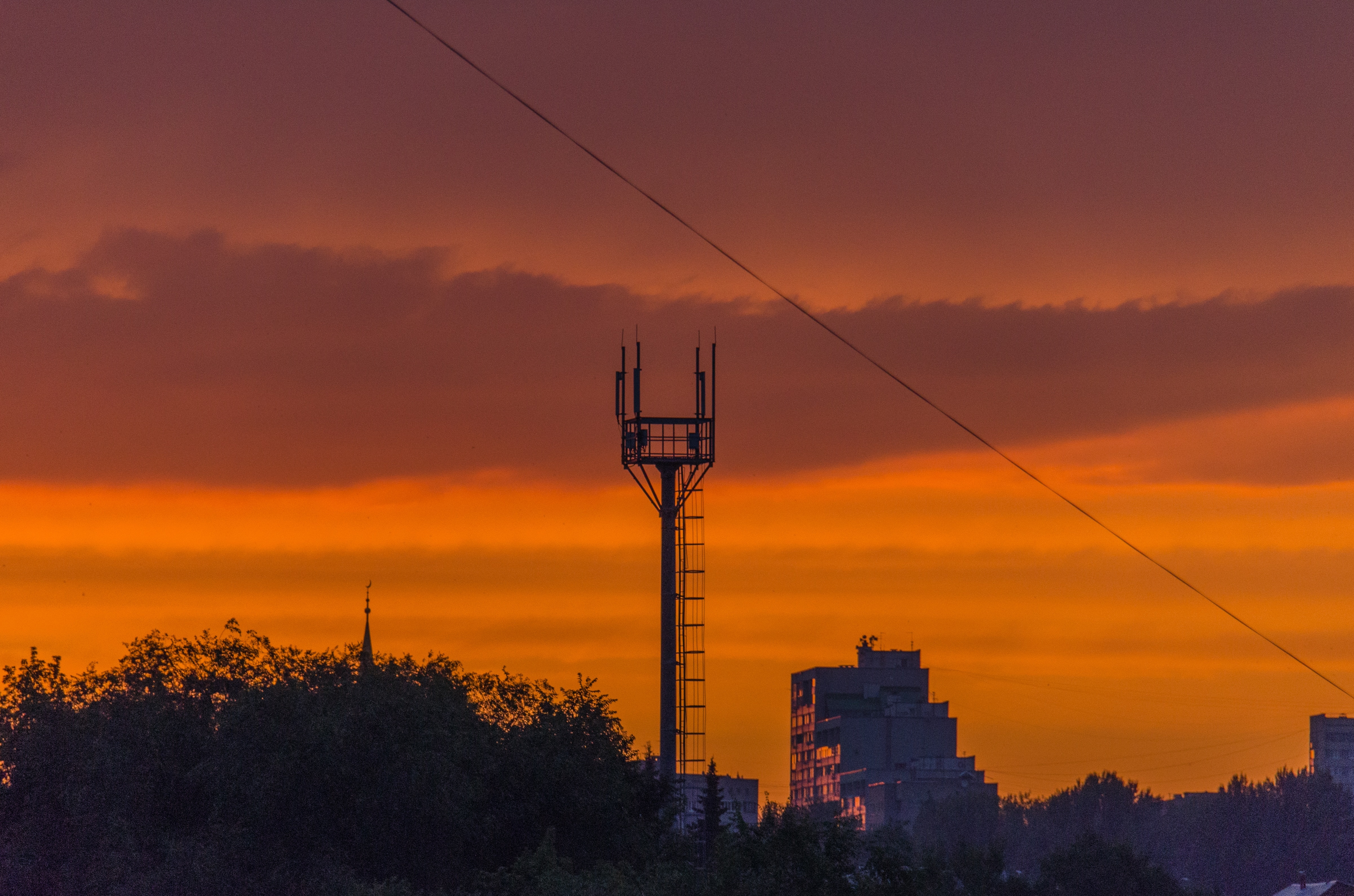 black tower during sunset
