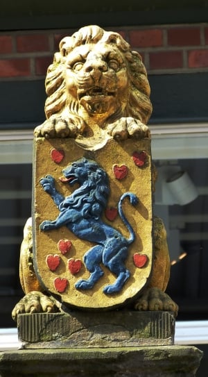 lion embossed shield lion statuette thumbnail