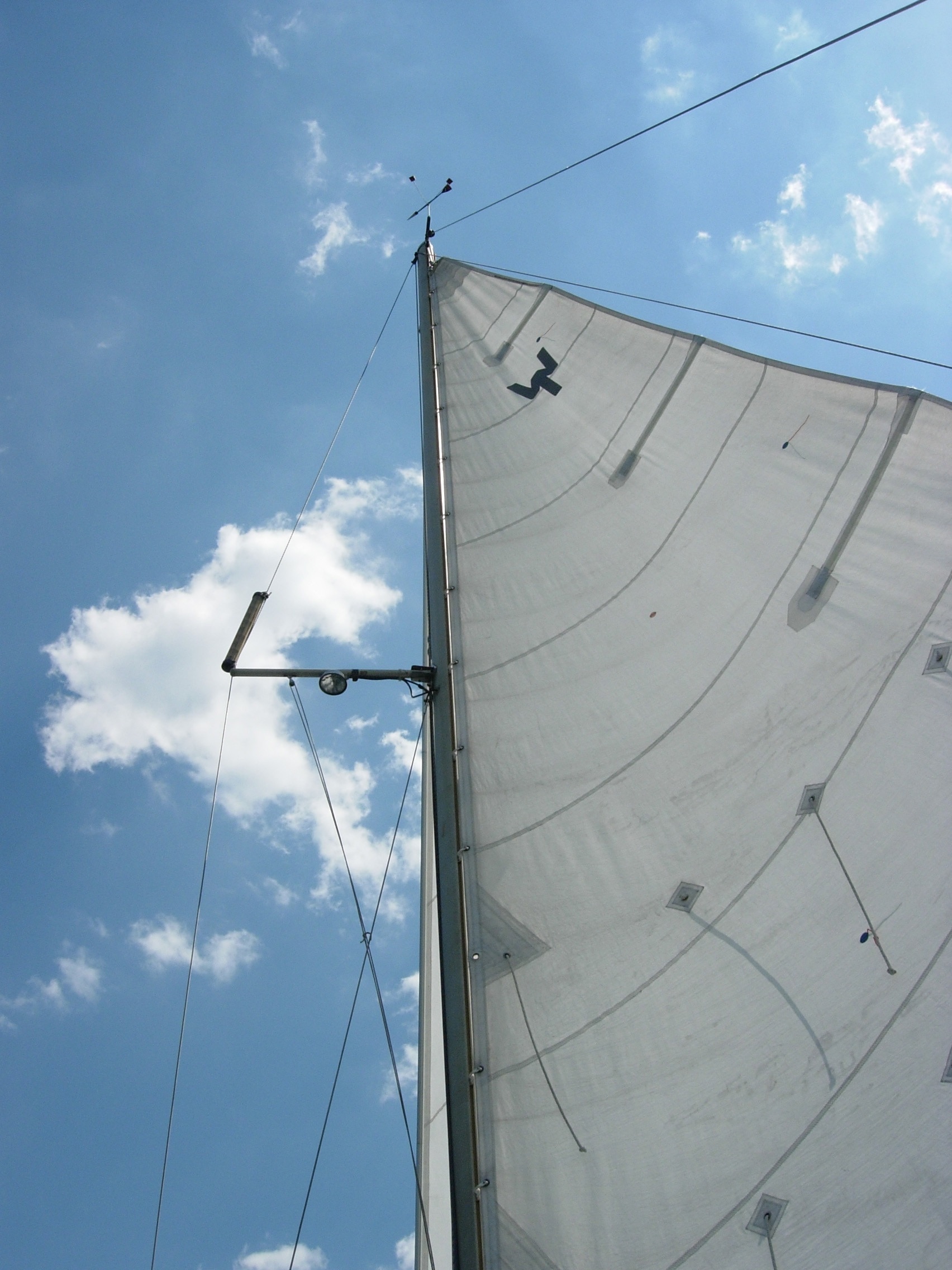 white sailing boat textile