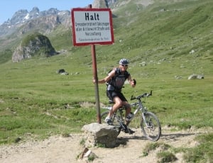 man on a bike in the mountains thumbnail