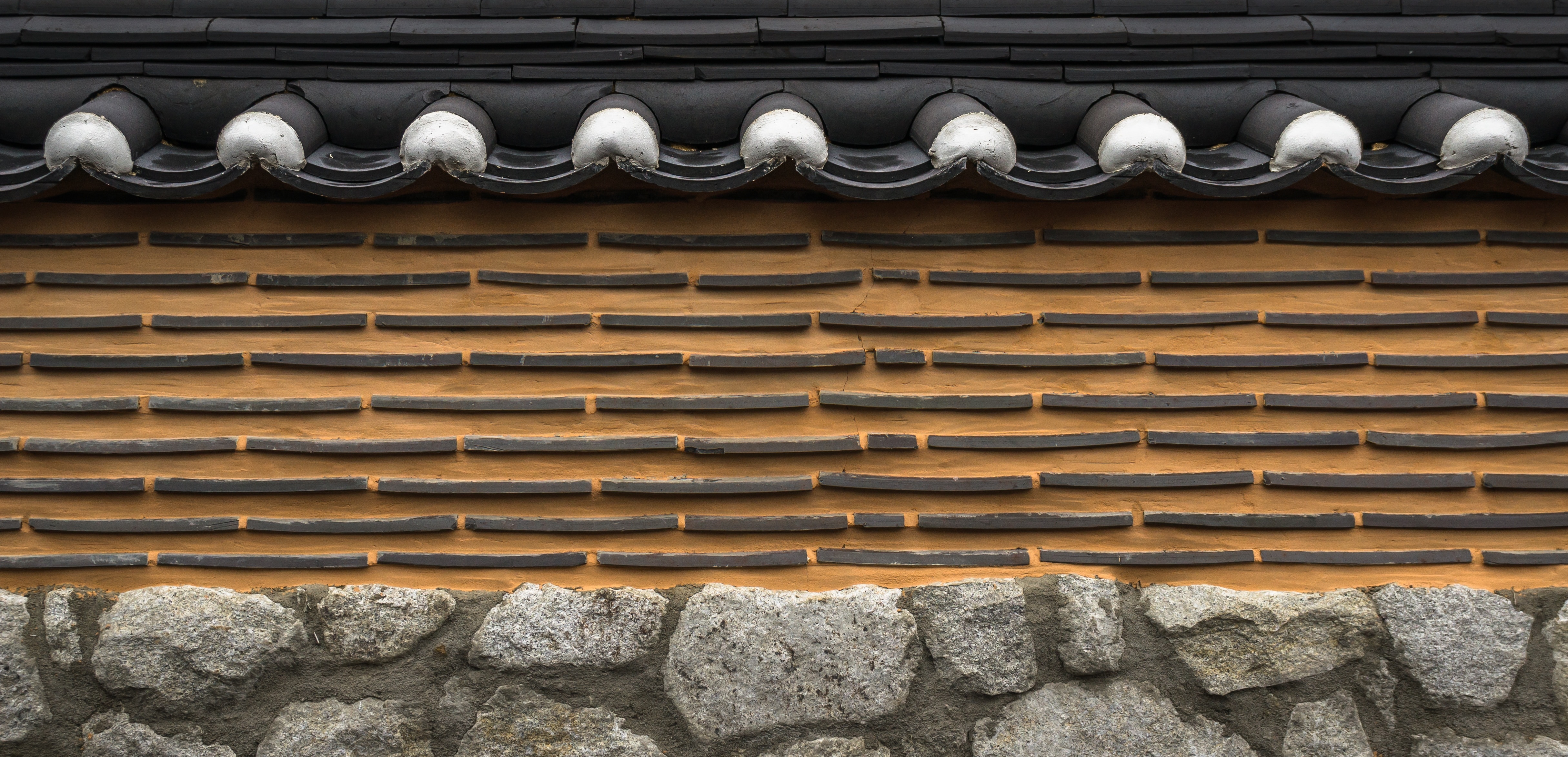 brown and black wall bricks