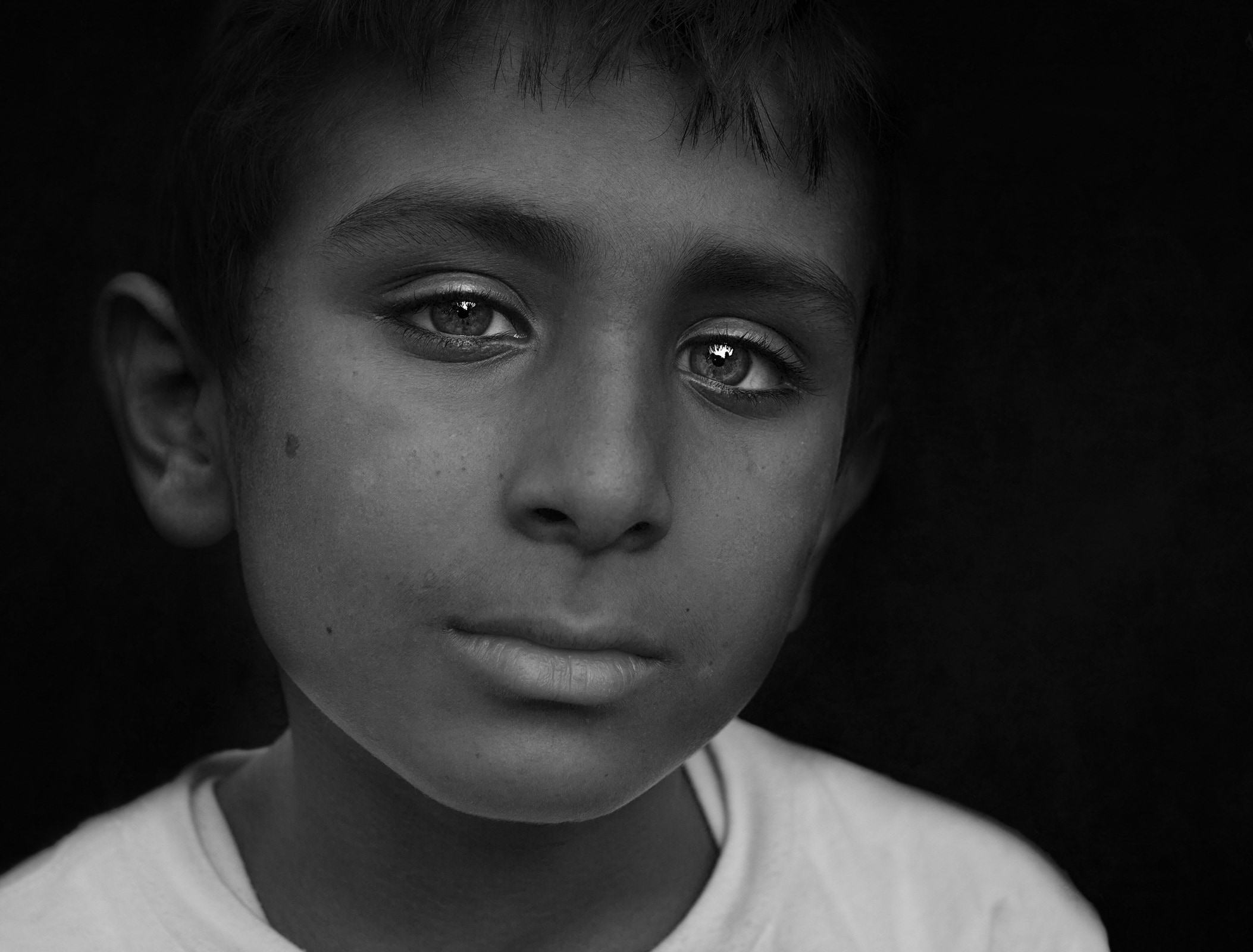 grayscale photo of a boy