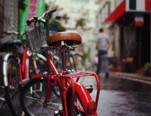 red and black cruiser bicycle thumbnail