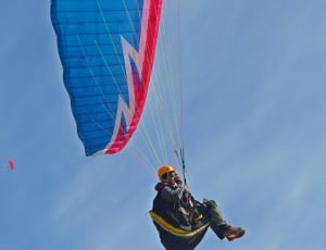 blue white and red paraglide thumbnail