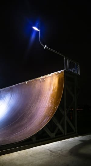 brown wooden half pipe with light thumbnail
