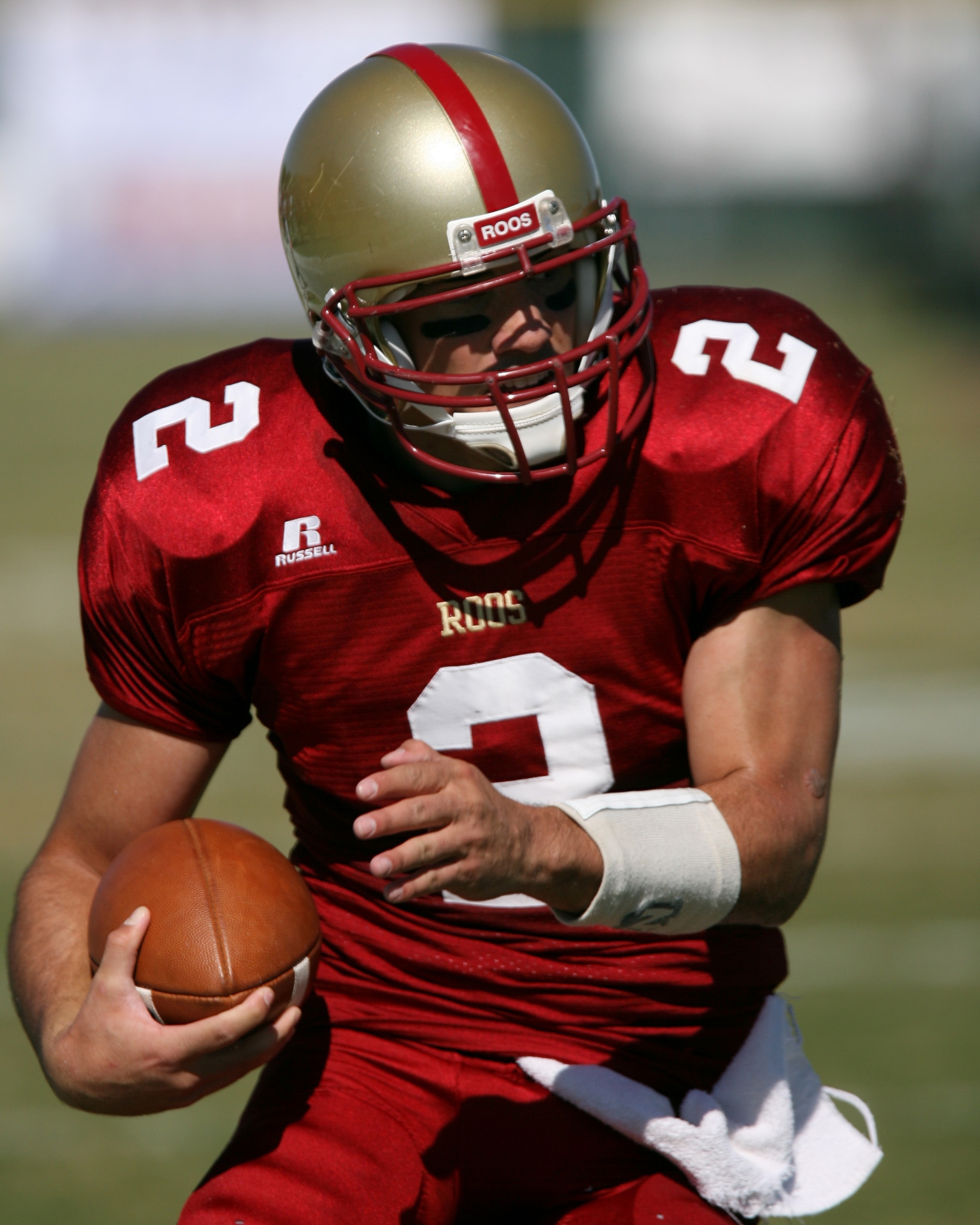 red and gold football helmet