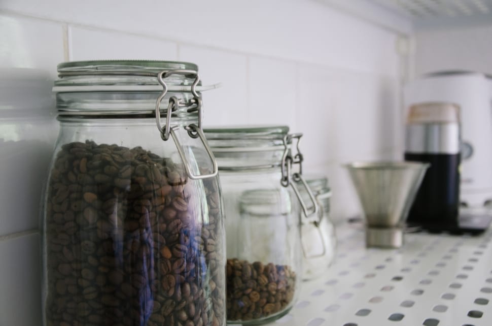 brown coffee beans in canister jar preview