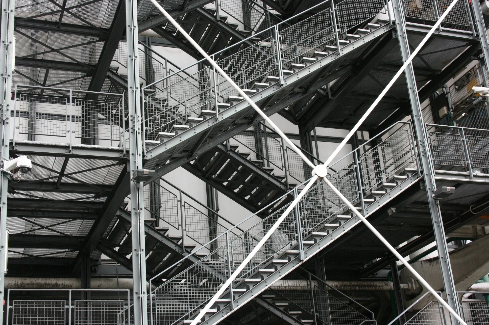 grayscale photo of building stairs