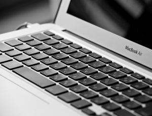 shallow focus photography of MacBook Air thumbnail