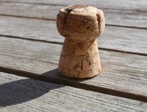 brown corck on brown wooden table top thumbnail