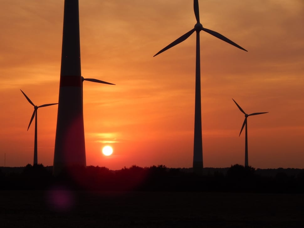 silhouette of wind turbine during sunset preview