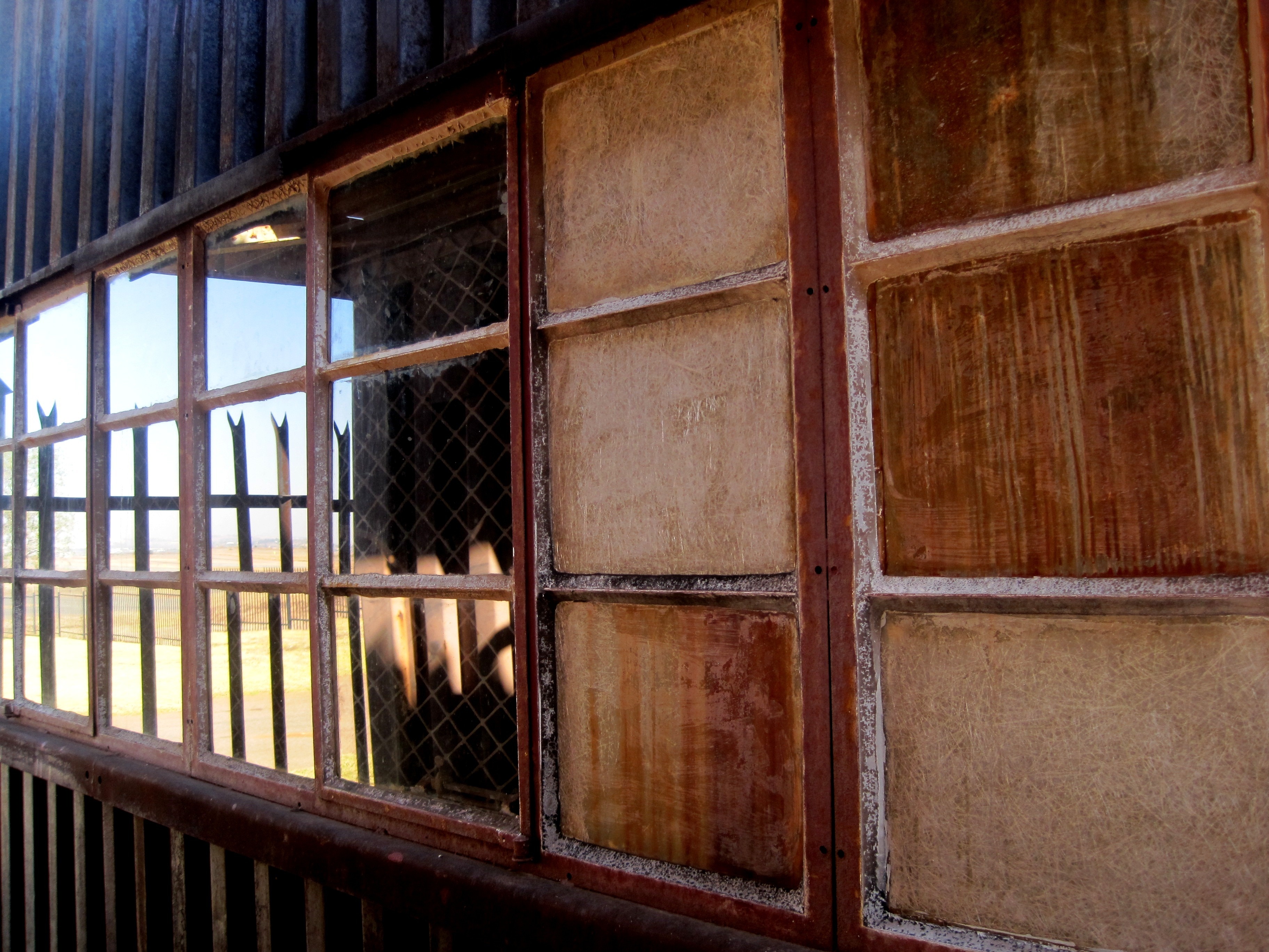 brown wooden frame windows