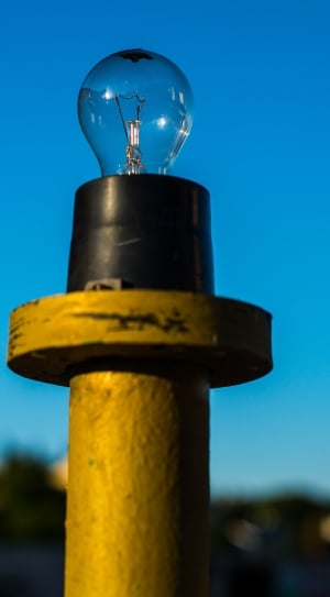 shallow focus photography of yellow post lamp thumbnail