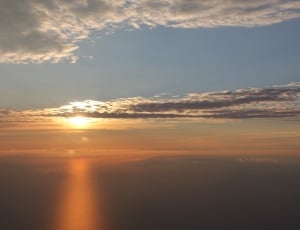 picture of sunrise from plane thumbnail