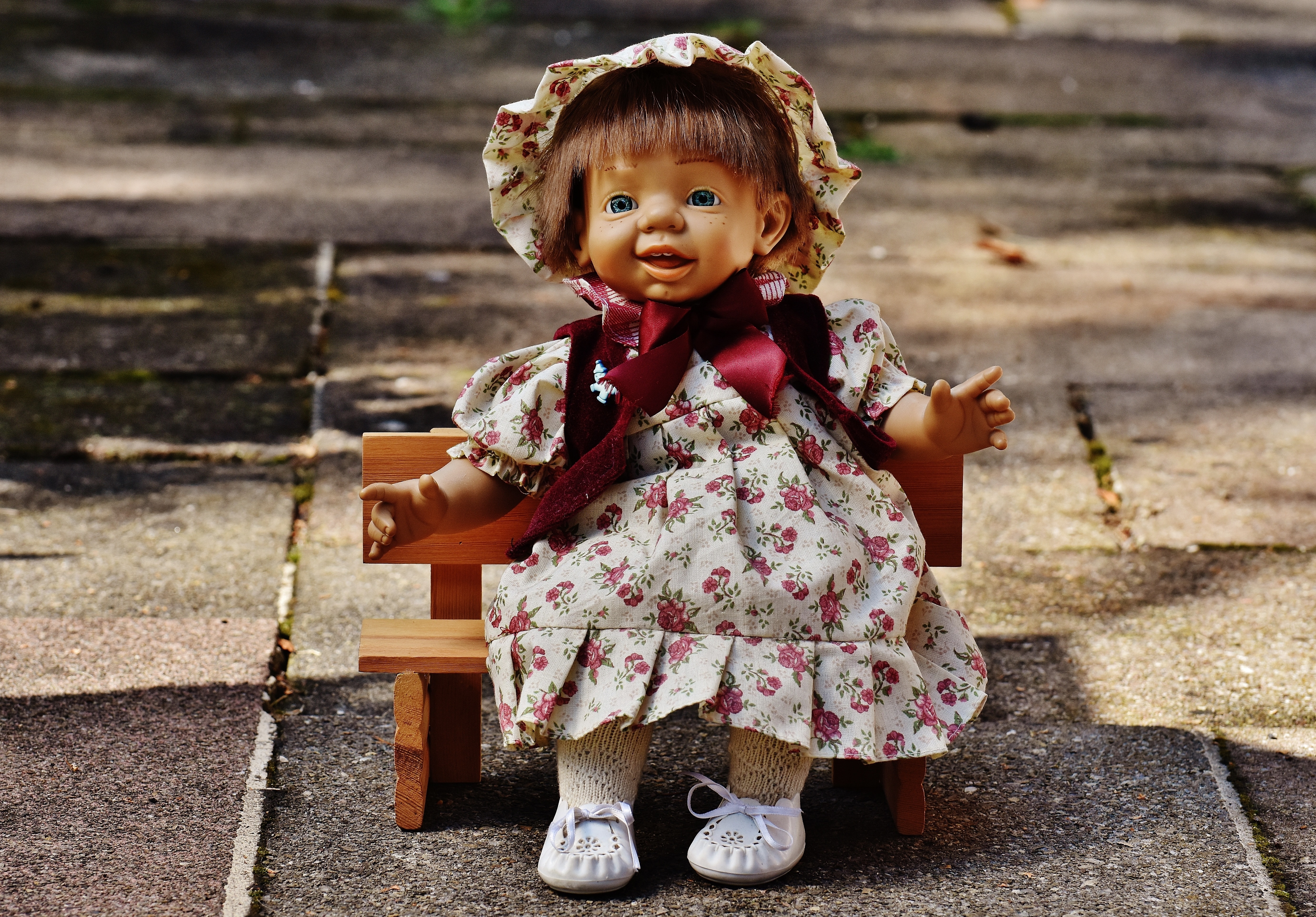 pink and white floral dressed doll