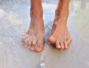human feet soak in water thumbnail