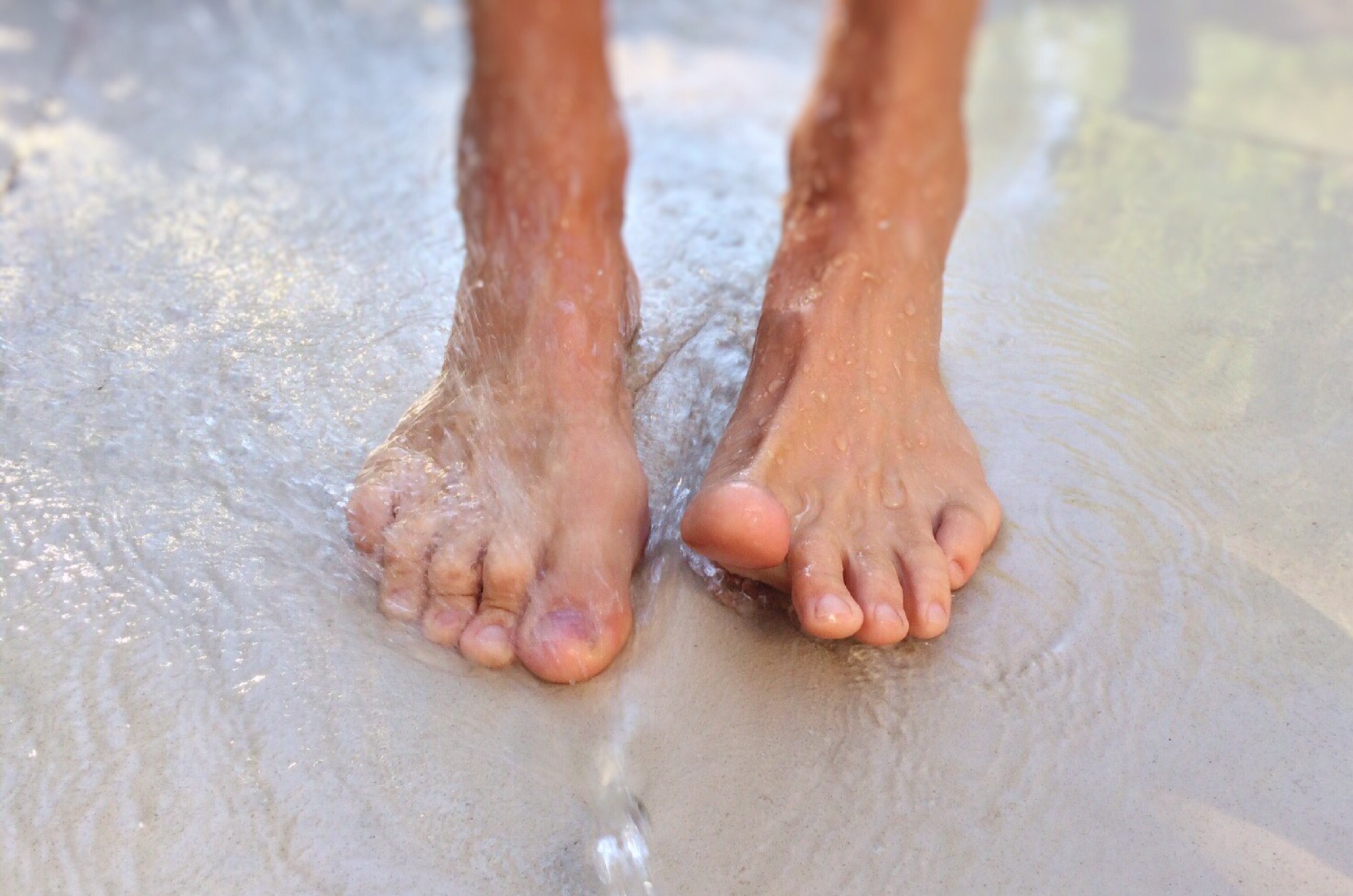 human feet soak in water
