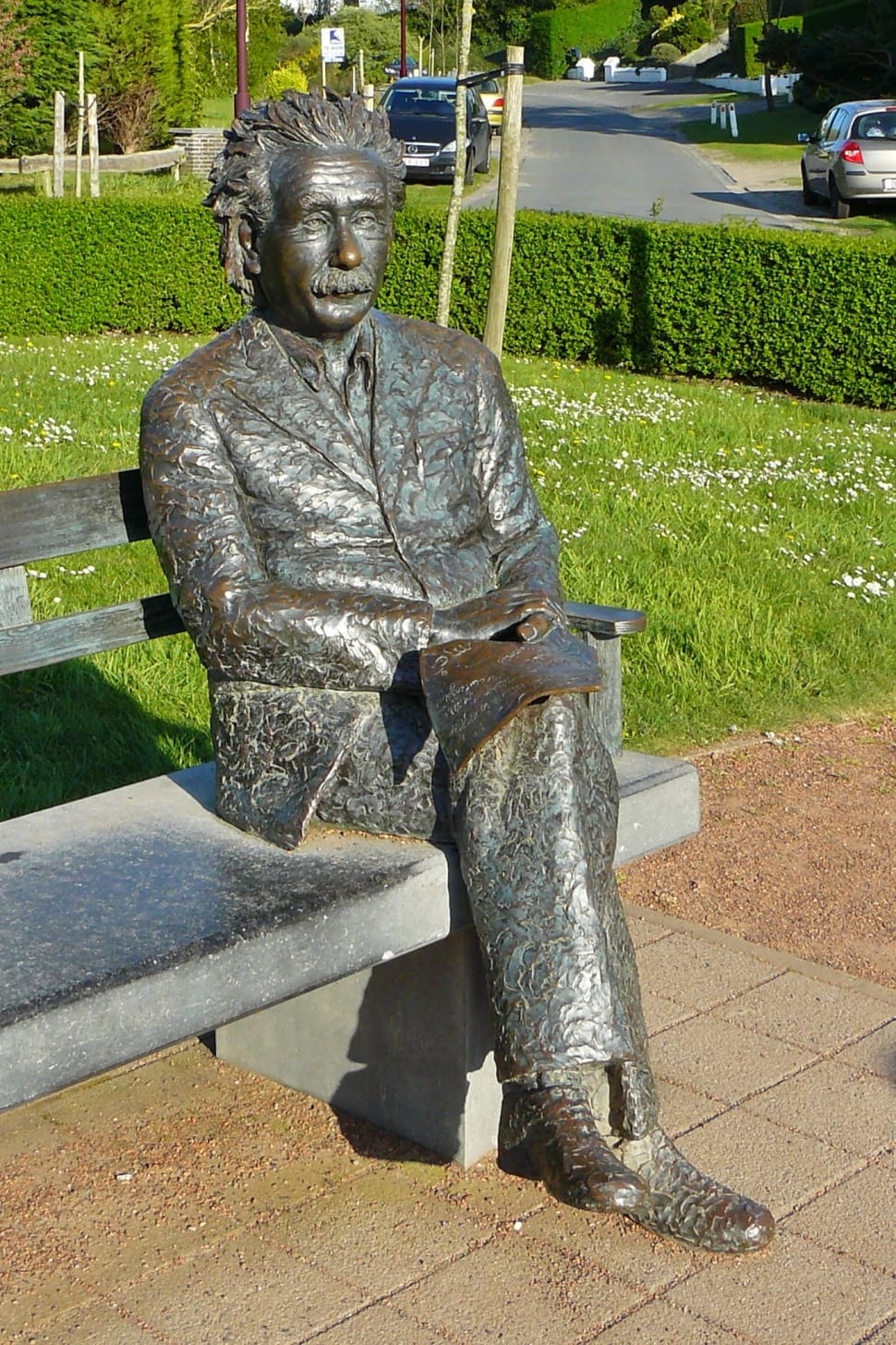 albert eistein sitting on bench statue preview