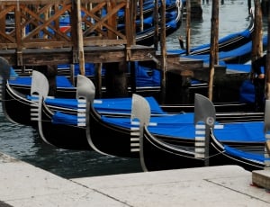 blue and black boats thumbnail