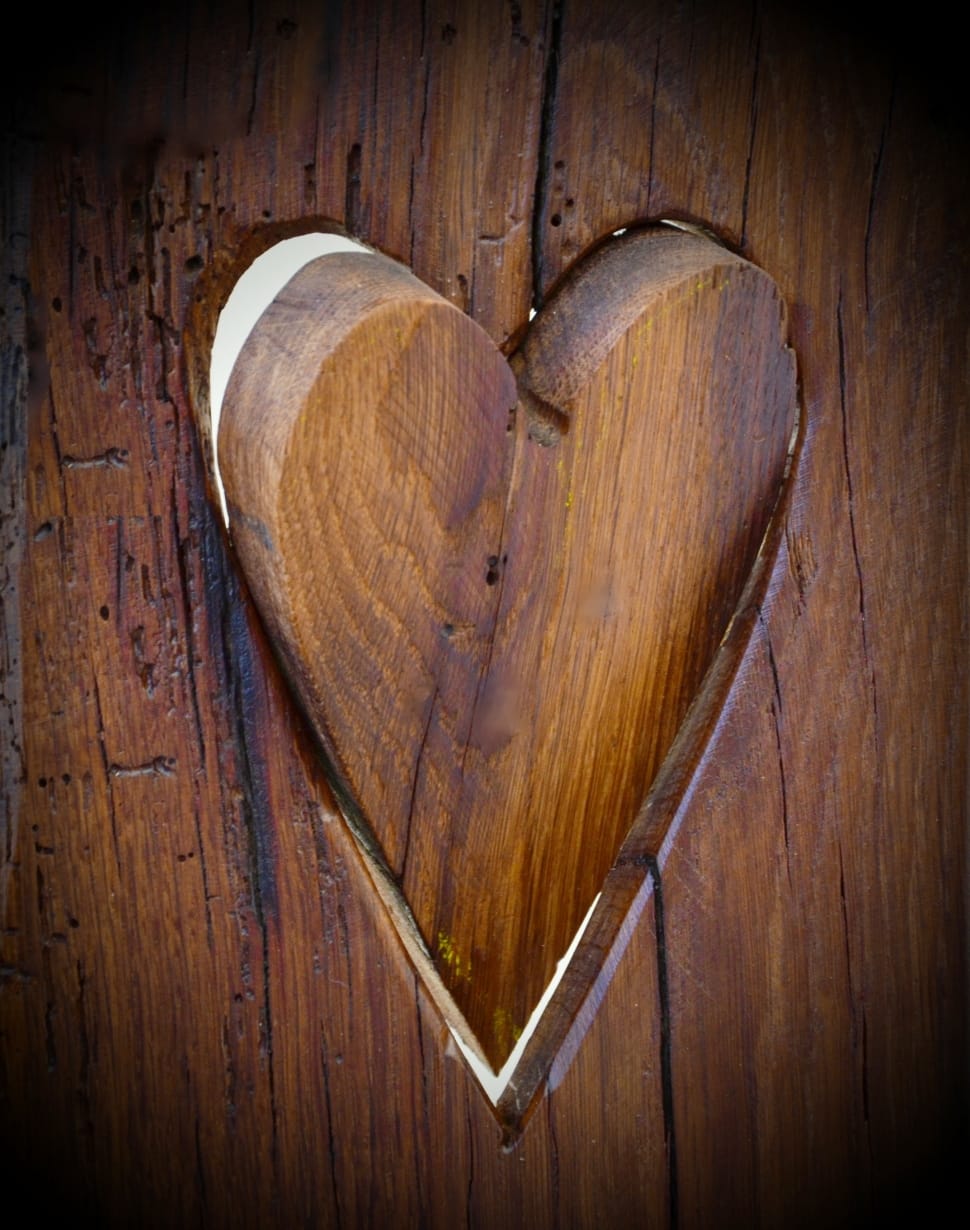 brown wooden cutout heart wall preview
