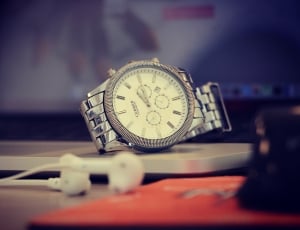 silver link round chronograph watch thumbnail