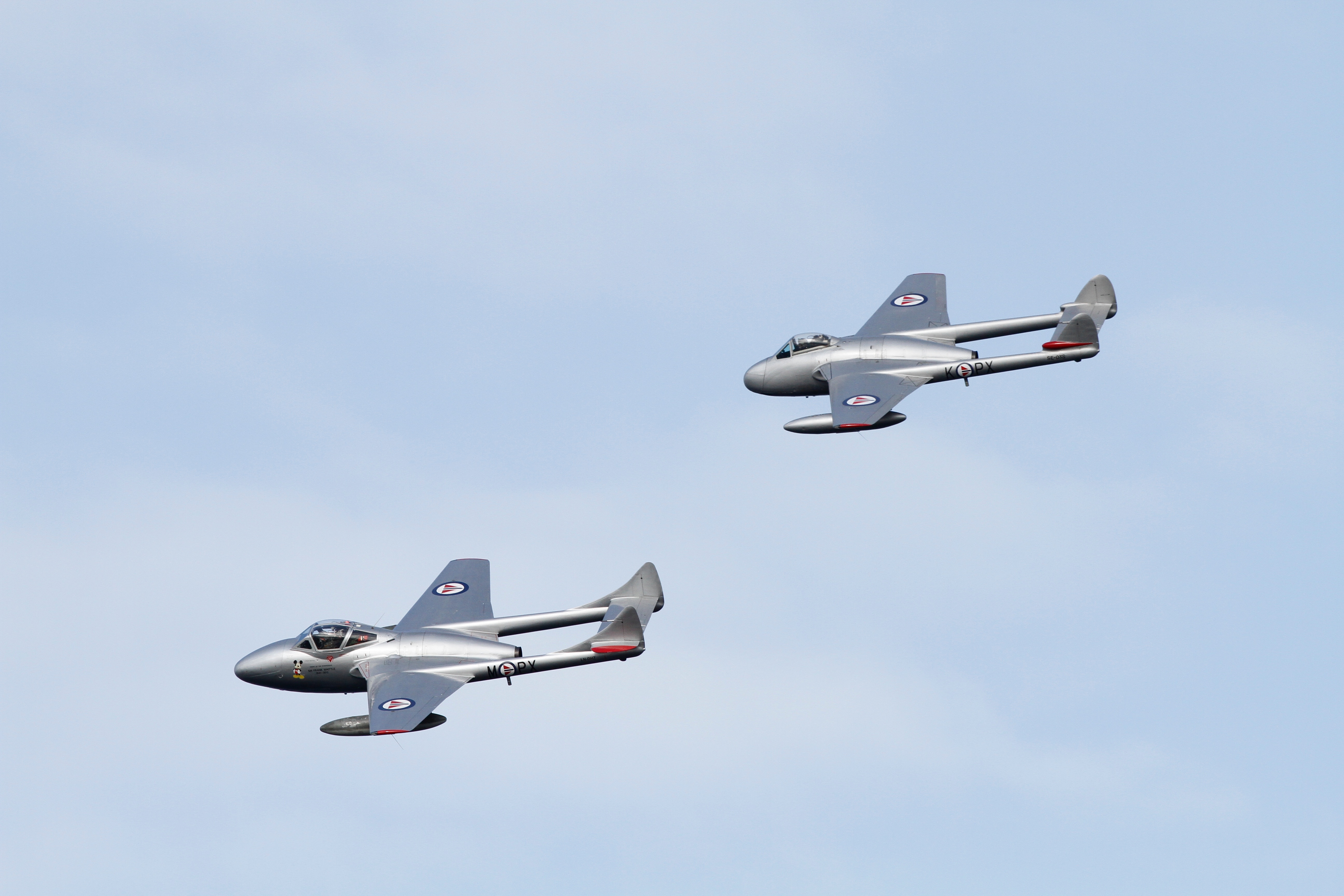 two gray monoplanes