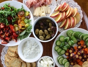 olives, cucumbers, apples, tomatoes, and cheese thumbnail