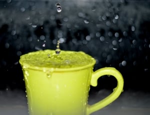 yellow ceramic mug with flowing water timelapse photography thumbnail
