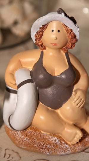 woman wearing swimsuit figurine thumbnail