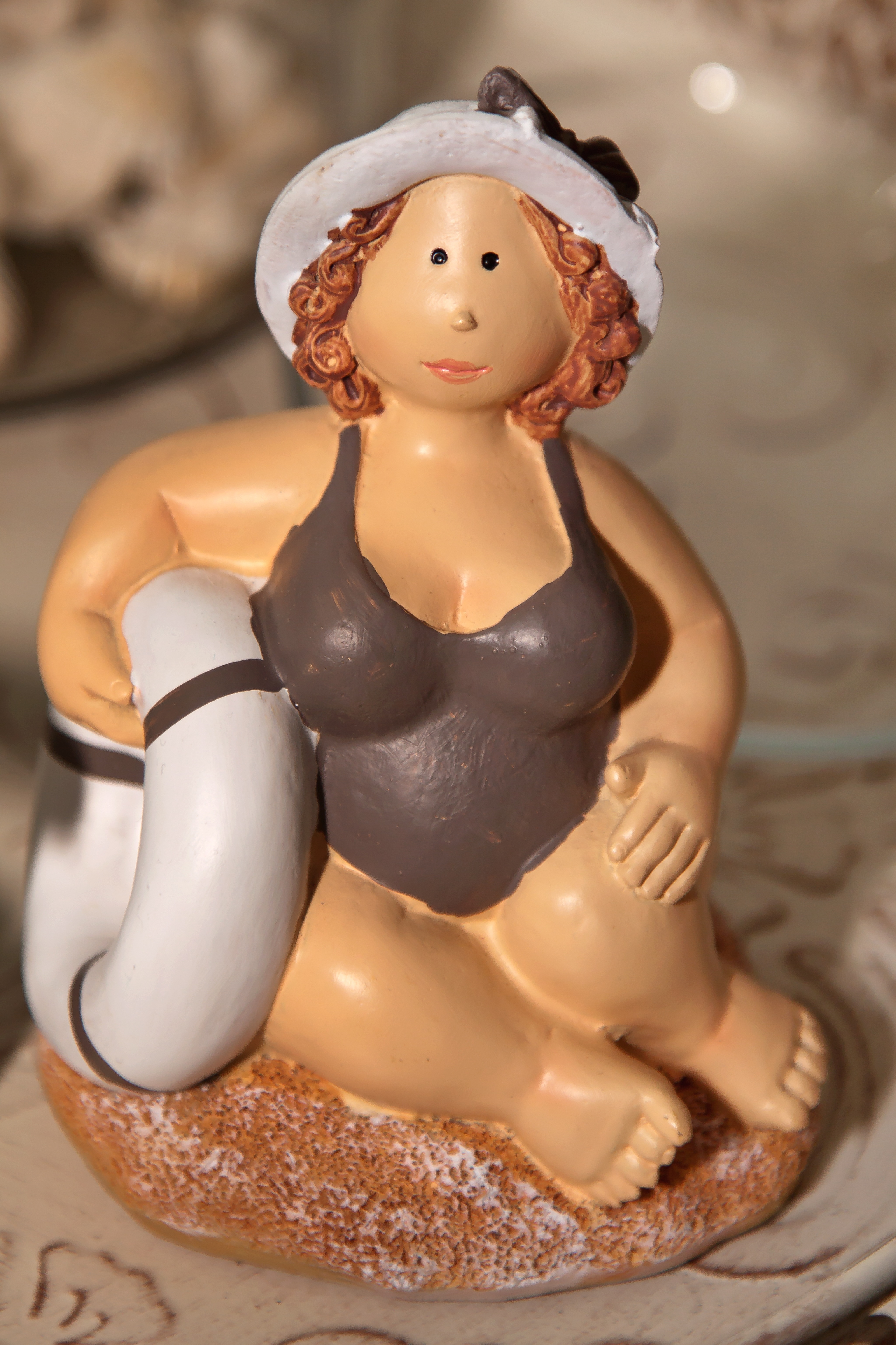 woman wearing swimsuit figurine