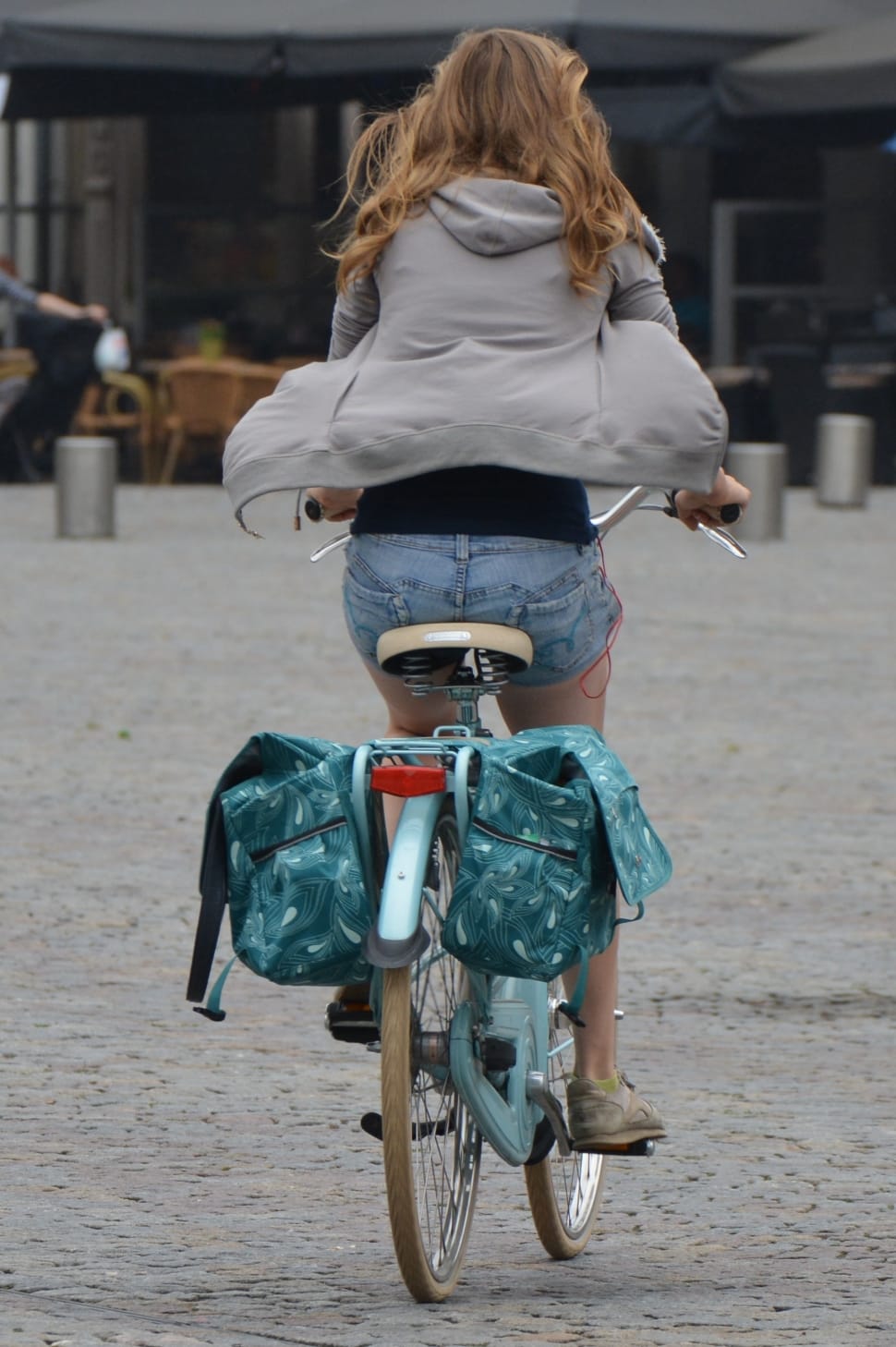 woman riding bicycle during daytime preview
