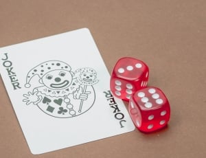 2 red dice and joker card thumbnail