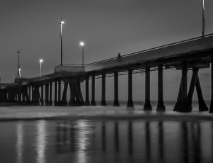 gray scale photograph of pier thumbnail