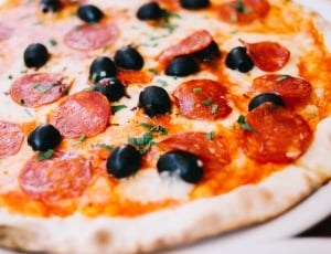 pepperoni pizza with black olives thumbnail