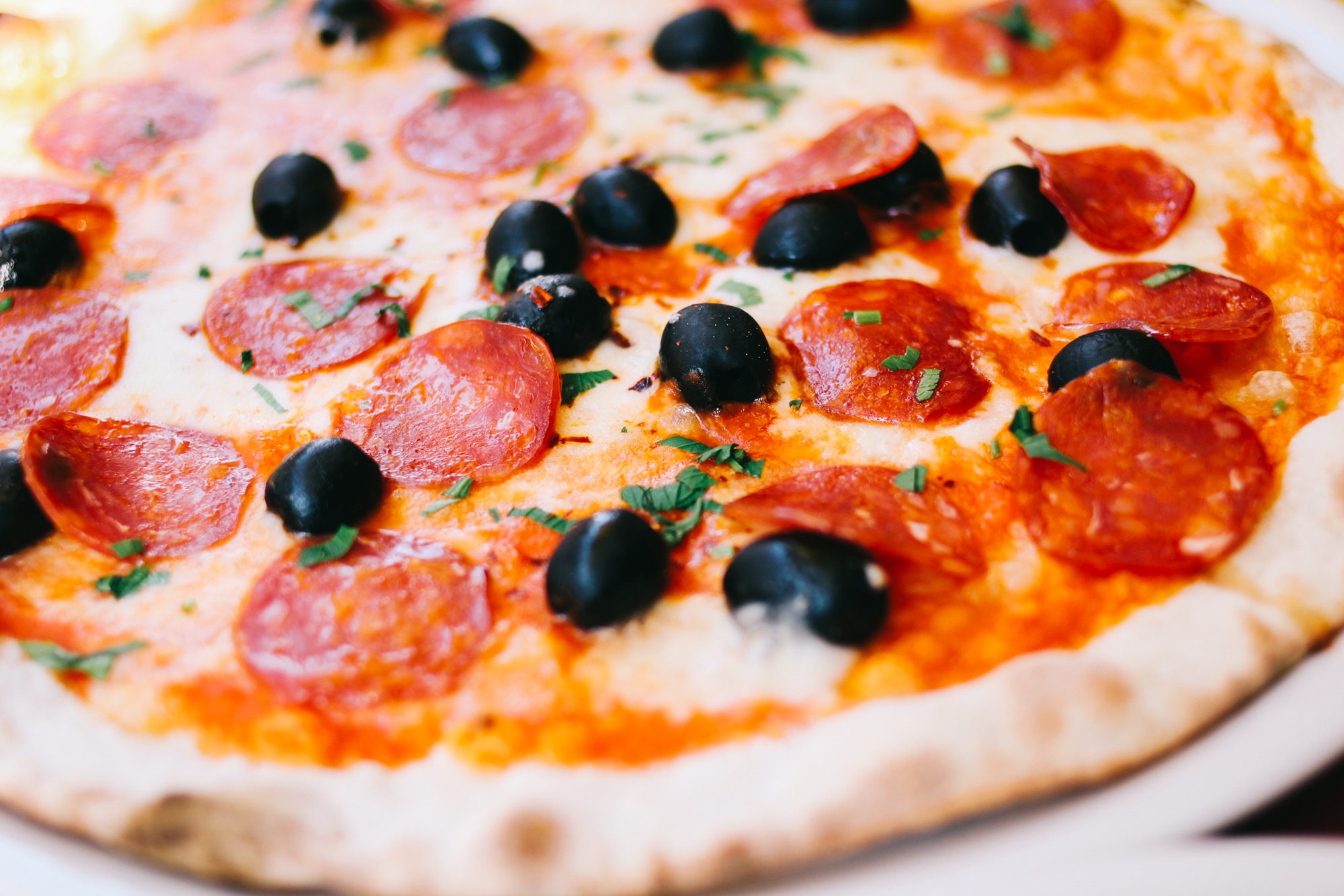 pepperoni pizza with black olives