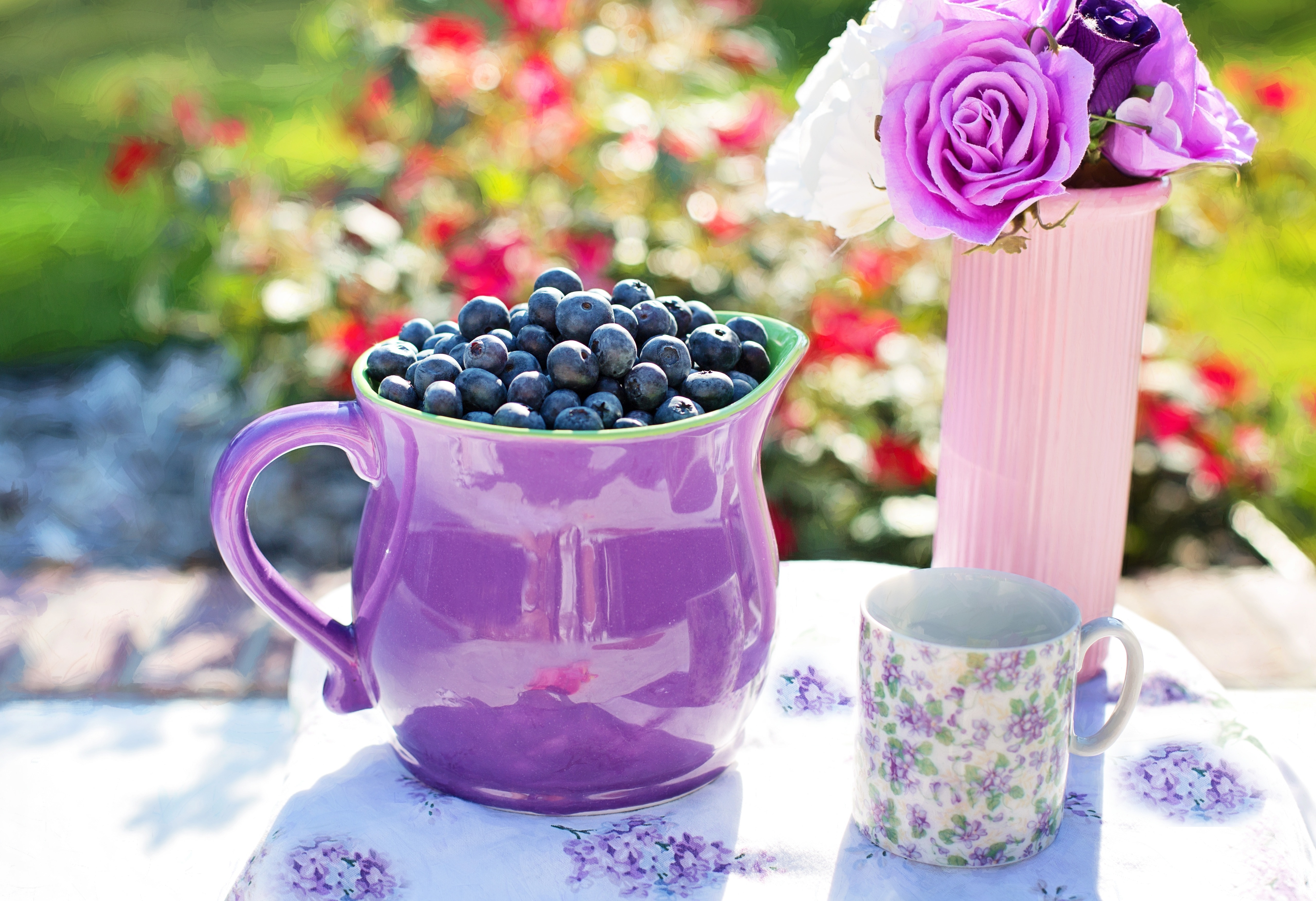 purple ceramic teapot and mug