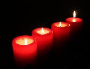 four red wax candles thumbnail