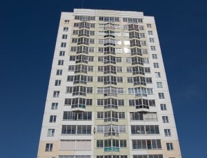 high rise building under blue sky during daytime thumbnail