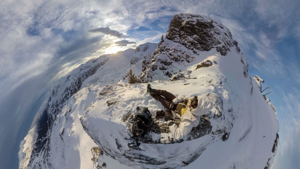bird's eye view of person on snow mountain during daytime preview