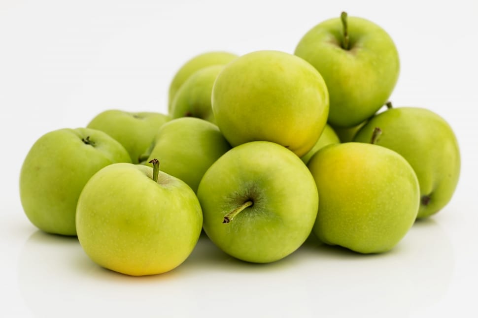 bunch of green apple on white surface preview