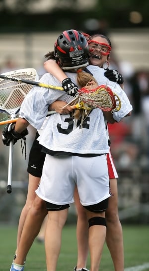 lacrosse players hugging thumbnail