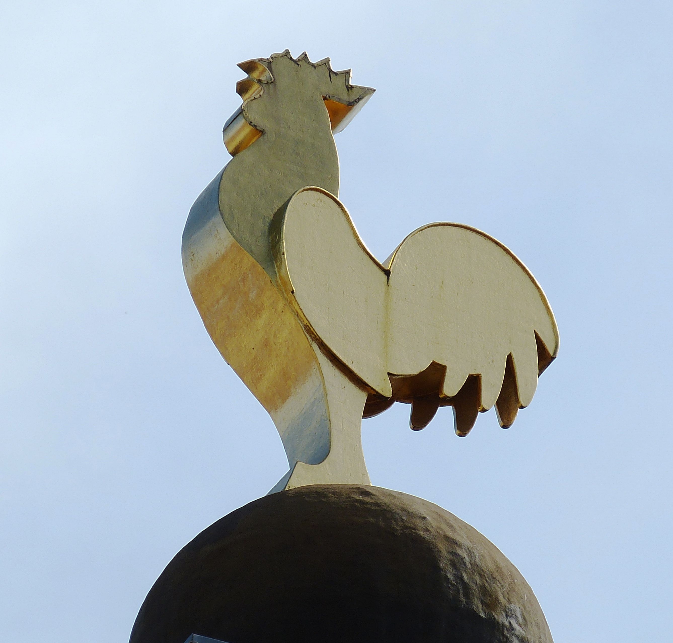 brown chicken statue