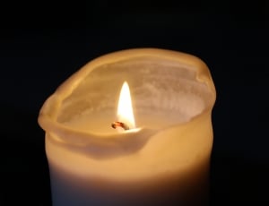 white votive candle thumbnail