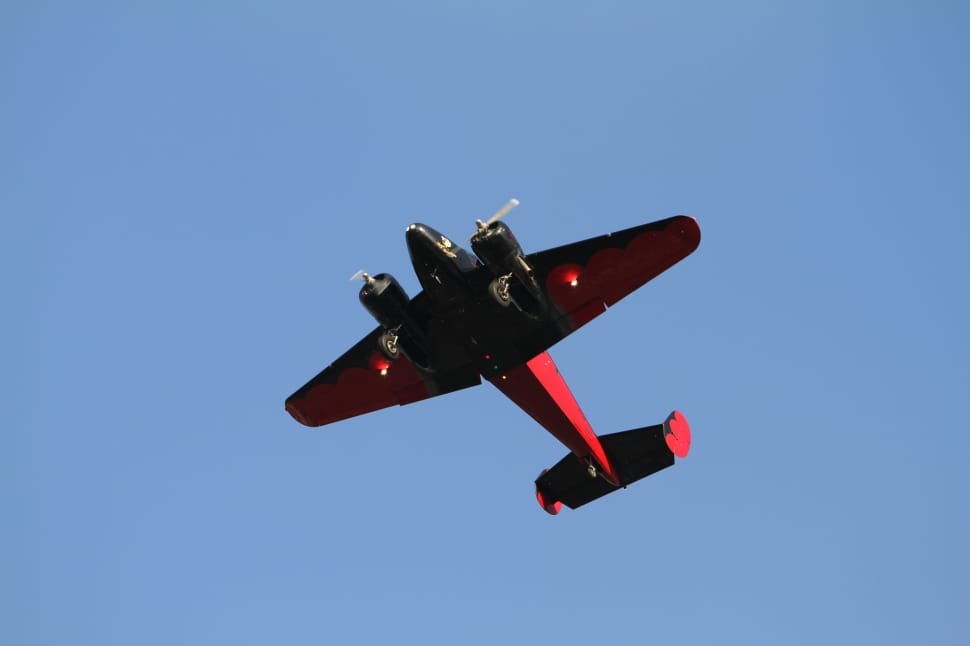 black and red biplane preview
