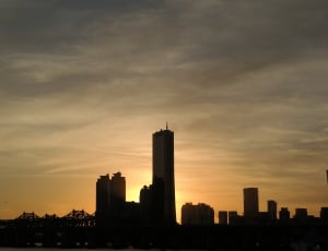 high rise building during sunset photography thumbnail