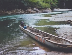gray wooden canoe thumbnail